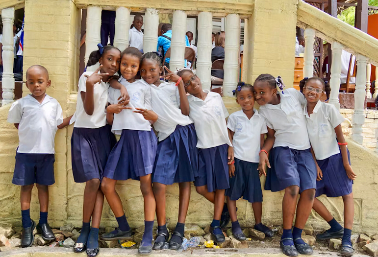 Happy school children in uniform